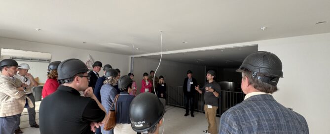 Community members tour SparkHaus while under construction