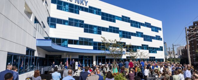 People standing in front of the OneNKY Center