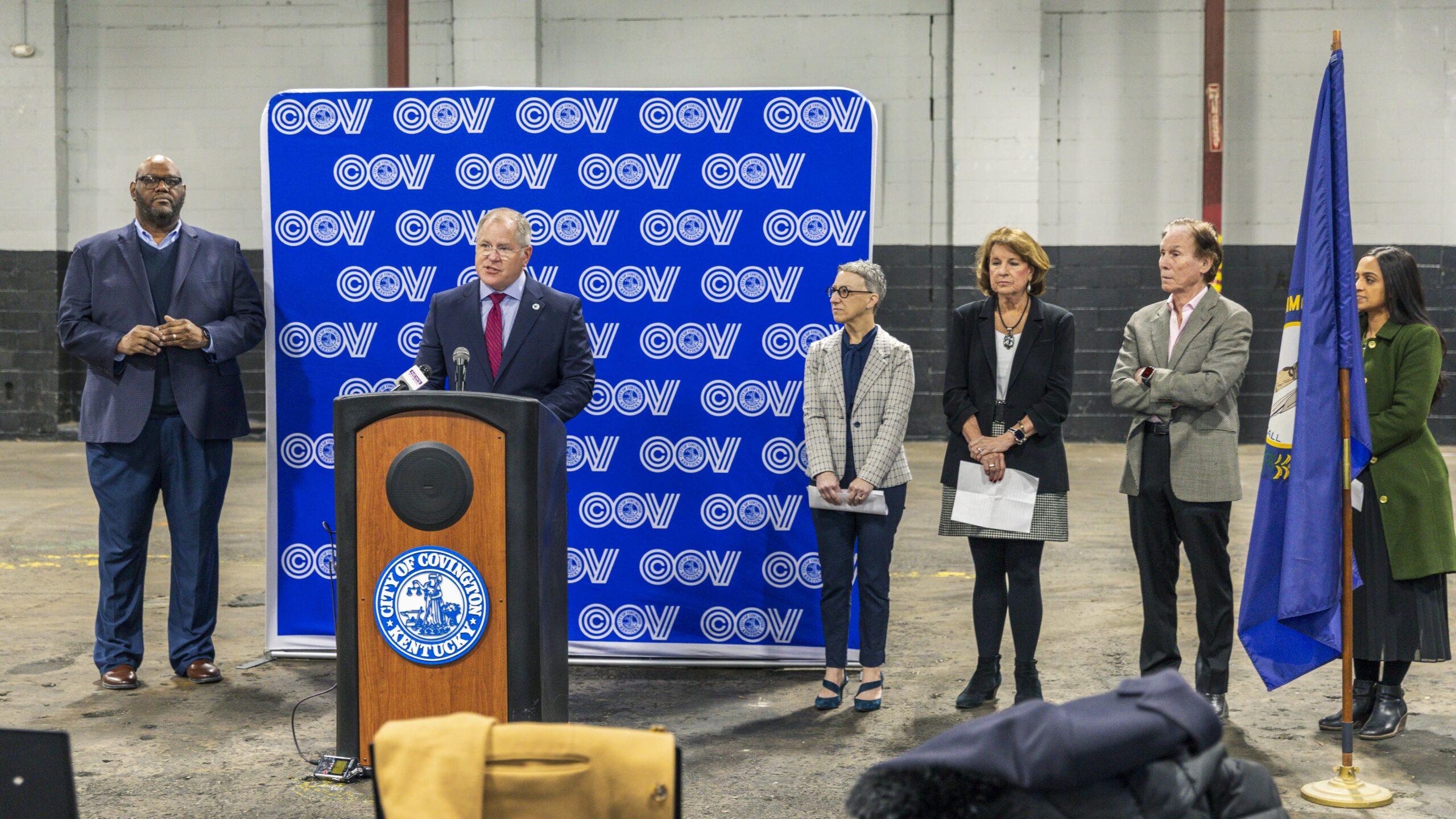 Kenton County Judge/Executive Kris Knochelmann stands at podium while speaking at Duro Bag press conference